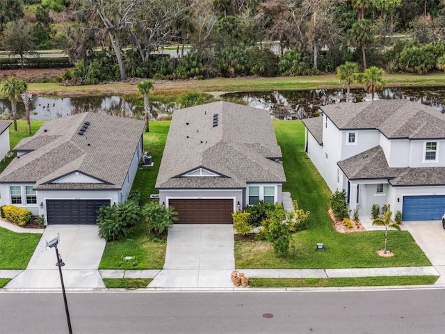 drone / aerial view featuring a water view