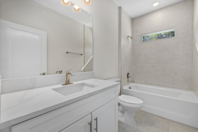 full bath featuring toilet, tile patterned flooring, bathtub / shower combination, and vanity