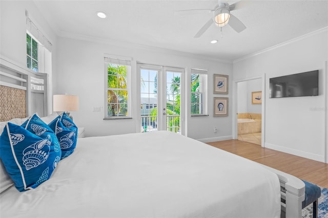 bedroom with access to outside, ornamental molding, wood finished floors, and baseboards