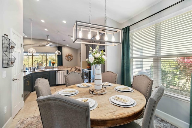 dining area with recessed lighting, vaulted ceiling, an inviting chandelier, and light tile patterned floors