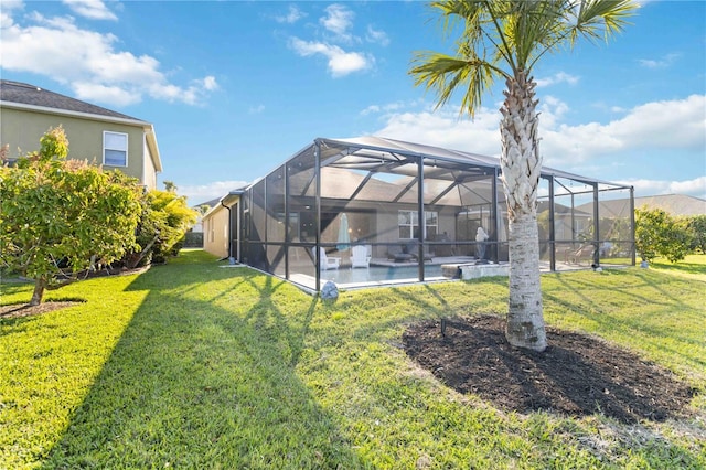 view of yard with glass enclosure and an outdoor pool