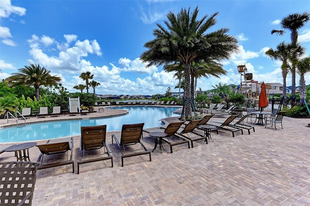 community pool featuring a patio