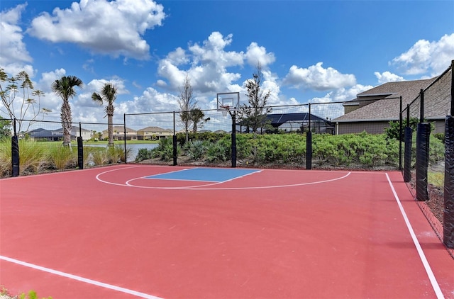 view of sport court with community basketball court and fence