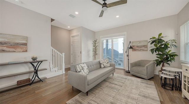 512 Laurel Park Dr, Sarasota, FL 34236 - living area featuring light wood finished floors, visible vents, ceiling fan, stairway, and recessed lighting