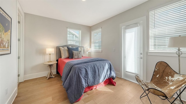 512 Laurel Park Dr, Sarasota, FL 34236 - bedroom with light wood-style flooring and baseboards