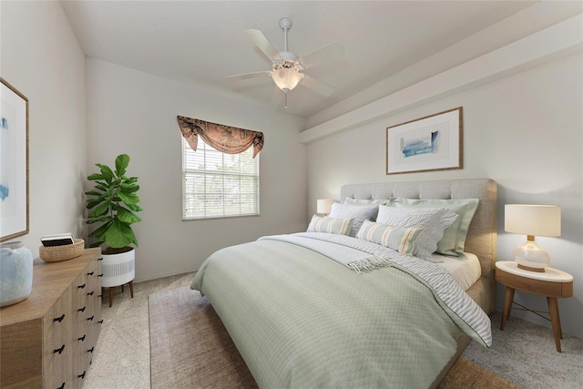 bedroom with carpet and a ceiling fan