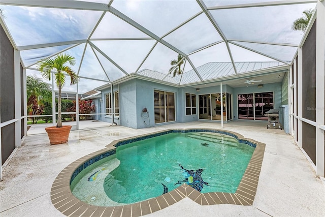 pool with a lanai and a patio