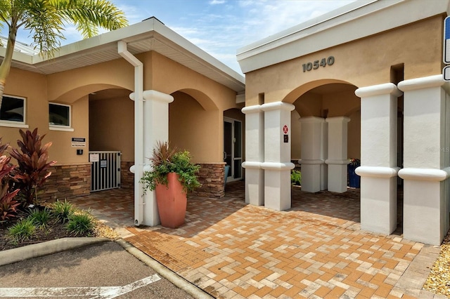 exterior space with stucco siding