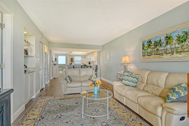 2320 Terra Ceia Bay Blvd Unit 808, Palmetto, FL 34221 - living area featuring wood finished floors and baseboards