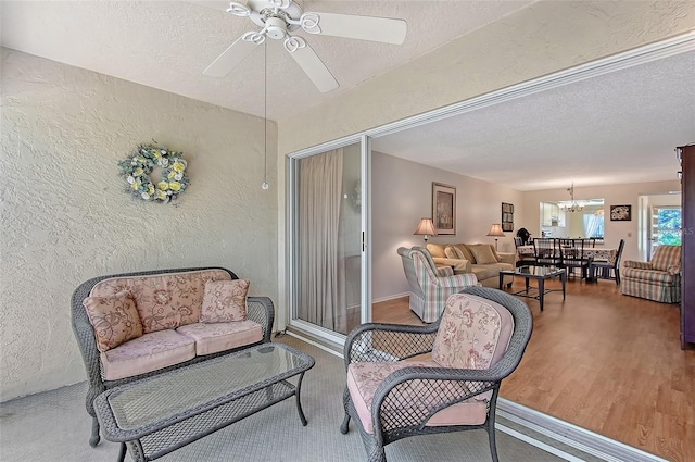 interior space featuring ceiling fan, outdoor dining space, and outdoor lounge area