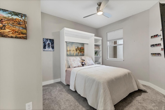 bedroom with carpet floors, baseboards, and a ceiling fan