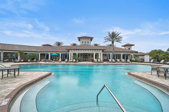 pool with a patio