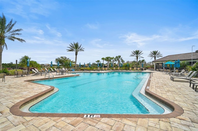 community pool featuring a patio