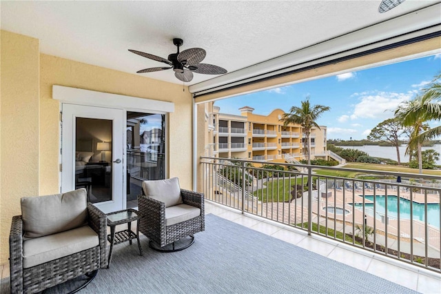 balcony featuring ceiling fan