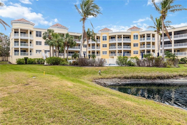 view of property with a water view