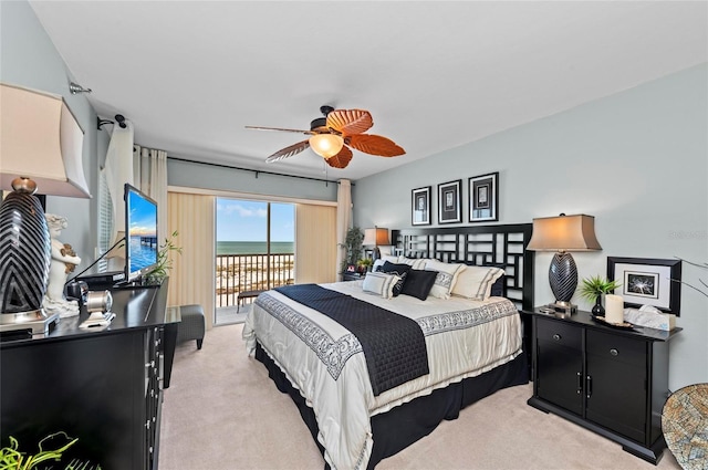 bedroom with light carpet, ceiling fan, and access to exterior