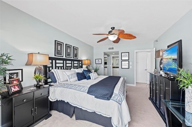 bedroom with a ceiling fan, light colored carpet, visible vents, and baseboards