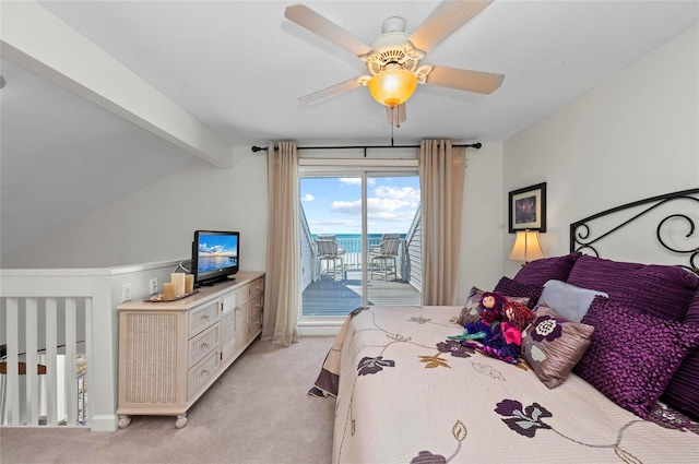 bedroom featuring access to exterior, ceiling fan, lofted ceiling with beams, and light colored carpet