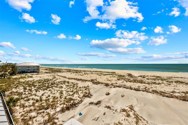 property view of water featuring a beach view