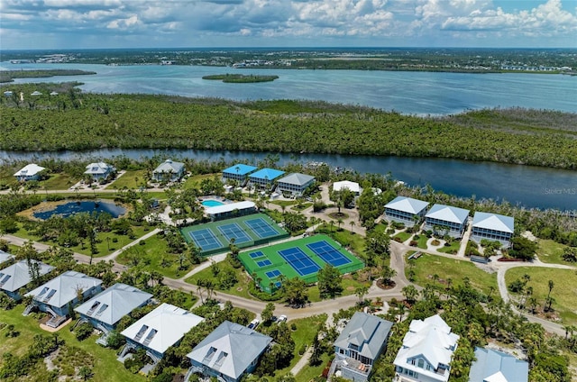 birds eye view of property with a residential view and a water view