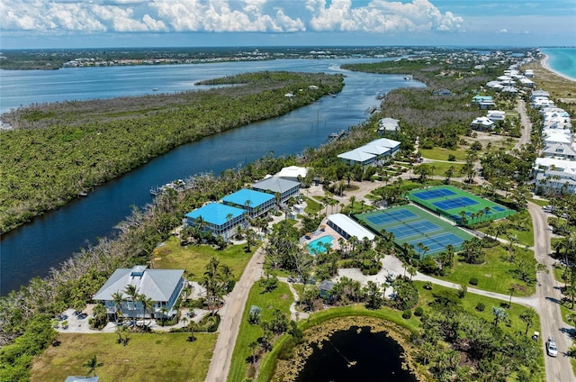 birds eye view of property featuring a water view