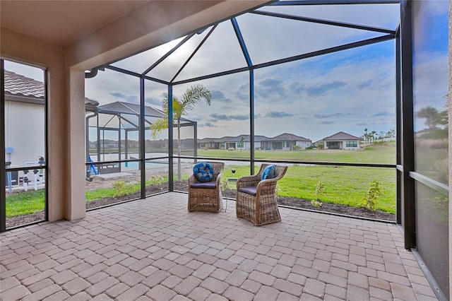 unfurnished sunroom with a residential view