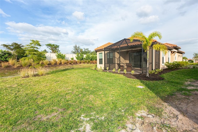 view of yard with a lanai