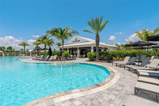 pool with a patio area