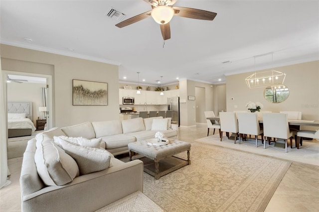 living room with ceiling fan, ornamental molding, visible vents, and recessed lighting