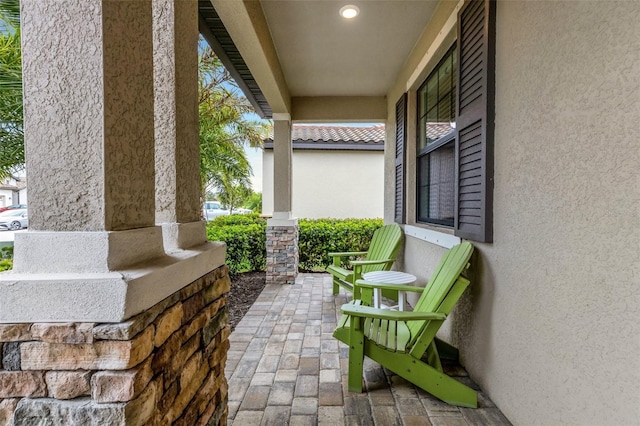 view of patio featuring covered porch