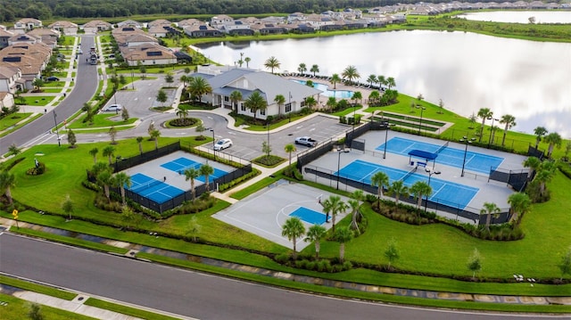 aerial view featuring a residential view and a water view