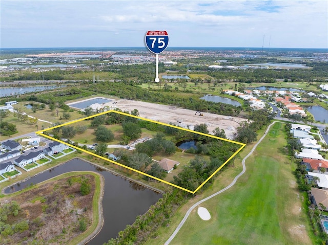 bird's eye view with a water view and a residential view