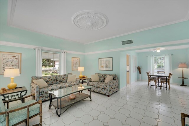 2 Antigua Cir Unit 4, Englewood, FL 34223 - living room with baseboards, visible vents, and crown molding