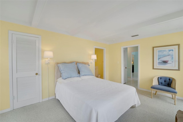 2 Antigua Cir Unit 4, Englewood, FL 34223 - bedroom featuring carpet, baseboards, and beam ceiling
