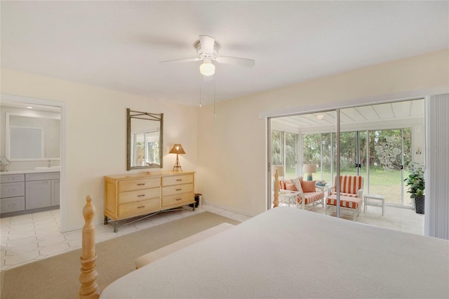 2 Antigua Cir Unit 4, Englewood, FL 34223 - bedroom with ceiling fan, a sunroom, baseboards, access to exterior, and ensuite bath