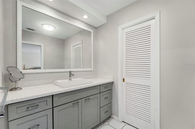 2 Antigua Cir Unit 4, Englewood, FL 34223 - bathroom with a closet, visible vents, and vanity