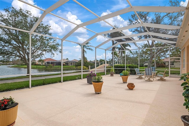 exterior space featuring a water view and a lanai