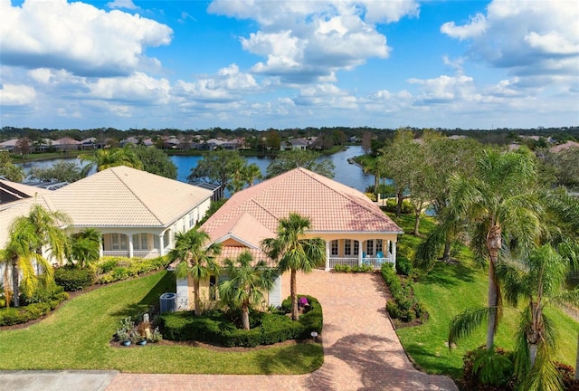 drone / aerial view with a water view