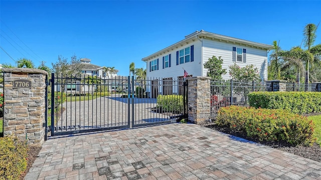 view of gate featuring fence