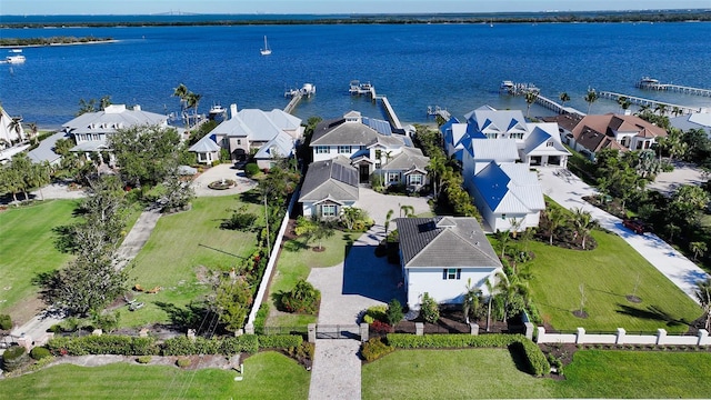 bird's eye view with a water view and a residential view