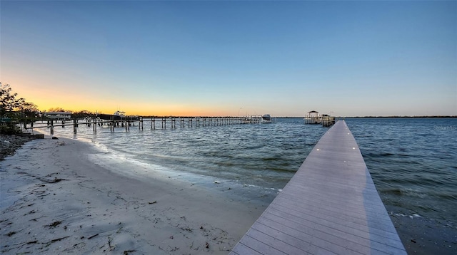 dock area featuring a water view