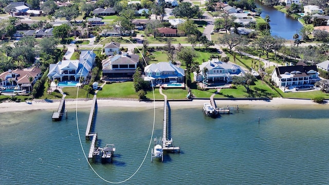 aerial view with a residential view and a water view