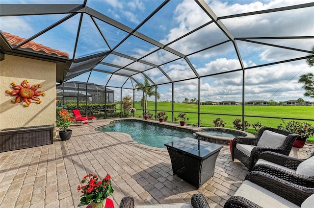 view of pool with glass enclosure, a pool with connected hot tub, and a patio area