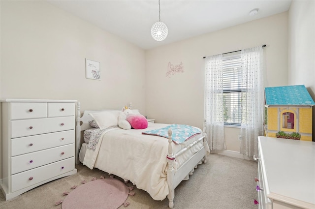 bedroom with light colored carpet