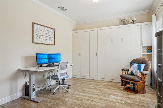 office area featuring light wood-style floors, visible vents, ornamental molding, and baseboards