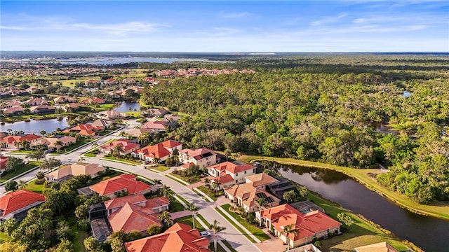 birds eye view of property featuring a residential view and a water view