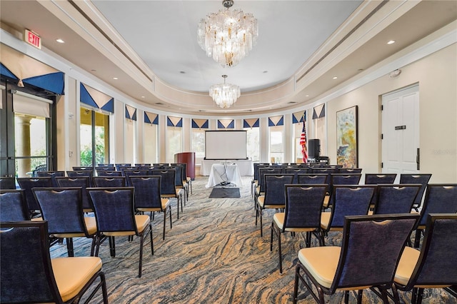 interior space with carpet floors, a raised ceiling, crown molding, and an inviting chandelier