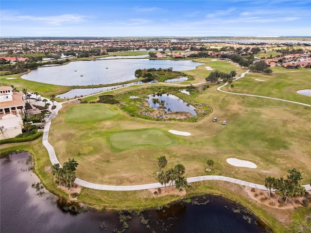 aerial view featuring a water view and golf course view