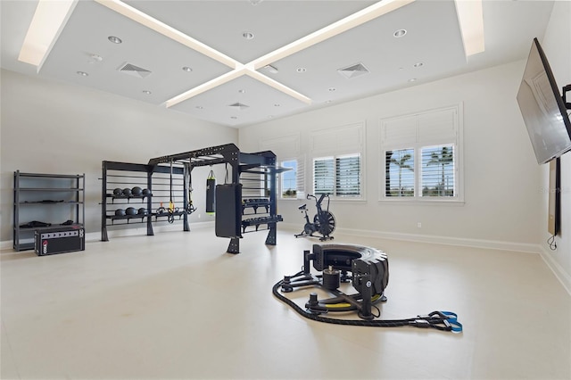 exercise area with visible vents, baseboards, and recessed lighting
