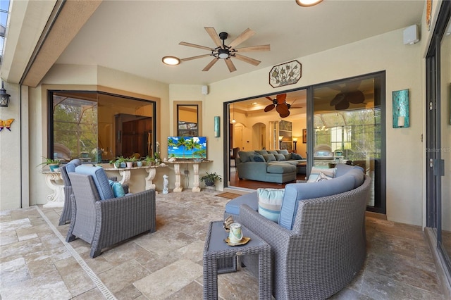 view of patio / terrace featuring outdoor lounge area and ceiling fan